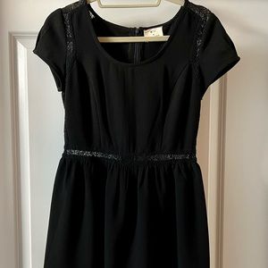 black dress with cute detail